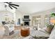 Bright and airy living room with modern furniture and an open floor plan at 4902 E Golden St, Mesa, AZ 85205