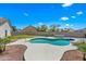 Sparkling pool, lush landscaping and sunny skies enhance the outdoor living experience of this Arizona backyard at 4902 E Golden St, Mesa, AZ 85205