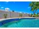 Inviting pool features a classic blue tile trim and cool, clear water, perfect for relaxation and enjoyment at 4902 E Golden St, Mesa, AZ 85205
