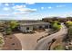 Luxury home with lush desert landscaping, mountain views and a private driveway at 6535 W Gold Mountain Pass, Phoenix, AZ 85083