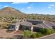 Estate home with mature landscaping, mountain views and a long private drive at 6535 W Gold Mountain Pass, Phoenix, AZ 85083