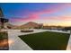Paver backyard featuring fire pit, pool, spa and mountain views at 6535 W Gold Mountain Pass, Phoenix, AZ 85083