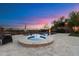An in-ground pool with a spa, desert views and an umbrella at 6535 W Gold Mountain Pass, Phoenix, AZ 85083