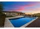 Desert backyard with a sparkling in-ground pool and gorgeous mountain views at 6535 W Gold Mountain Pass, Phoenix, AZ 85083