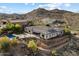 Beautiful desert home featuring a private pool, spa, covered patio, and landscaped backyard at 6535 W Gold Mountain Pass, Phoenix, AZ 85083