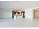 Open kitchen featuring an island with breakfast bar, stainless steel appliances, and modern finishes at 6728 N 190Th Dr, Waddell, AZ 85355