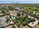 Aerial view of the property with a swimming pool and mature trees at 6800 E Exeter Blvd, Scottsdale, AZ 85251