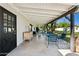 Spacious covered patio with ample seating, ideal for outdoor dining and entertaining guests at 6800 E Exeter Blvd, Scottsdale, AZ 85251