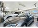 Spacious two-car garage with ample storage space, featuring two cars and a bicycle rack at 6800 E Exeter Blvd, Scottsdale, AZ 85251