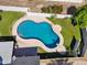 Aerial view of a pebble shaped pool with diving board at 6800 E Exeter Blvd, Scottsdale, AZ 85251