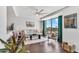 Bright living room area with modern furnishings, a large window with views, and contemporary decor at 6803 E Main St # 5503, Scottsdale, AZ 85251
