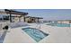 A rooftop pool and hot tub are surrounded by lounge seating and city views at 6803 E Main St # 5503, Scottsdale, AZ 85251