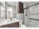 Bathroom featuring modern fixtures, tile shower, and white countertop at 687 W Flintlock Way, Chandler, AZ 85286