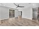 Bright room with access to outdoor patio and modern ceiling fan at 687 W Flintlock Way, Chandler, AZ 85286