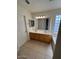 Bathroom features a double sink vanity and tile flooring at 7176 W Blackhawk Dr, Glendale, AZ 85308