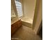 This bathroom features a large soaking tub, with a toilet and vanity nearby at 7176 W Blackhawk Dr, Glendale, AZ 85308
