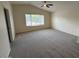 Bedroom featuring a ceiling fan and wide windows with blinds at 7176 W Blackhawk Dr, Glendale, AZ 85308