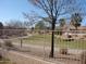 Scenic view of green space from the fenced backyard for peaceful outdoor enjoyment at 7176 W Blackhawk Dr, Glendale, AZ 85308