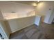 Second story hallway features neutral walls and carpet at 7176 W Blackhawk Dr, Glendale, AZ 85308