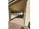 Covered patio with concrete floor overlooking the fenced pool at 7176 W Blackhawk Dr, Glendale, AZ 85308