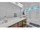 Bathroom boasts a shower and tub combination at 7234 W Aire Libre Ave, Peoria, AZ 85382