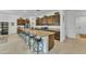 Spacious kitchen features a large island, granite countertops, and ample cabinet space at 7234 W Aire Libre Ave, Peoria, AZ 85382