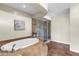 Luxurious bathroom featuring a soaking tub, glass enclosed shower and tiled accents at 7524 E Leland Cir, Mesa, AZ 85207