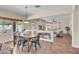 Bright and airy dining room featuring views to backyard and open floor plan at 7524 E Leland Cir, Mesa, AZ 85207