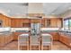 Well-appointed kitchen with granite countertops, modern appliances, island cooktop, and ample cabinet space at 7524 E Leland Cir, Mesa, AZ 85207