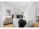 Stylish bedroom features a ceiling fan, a plush bed, and modern bedside tables at 7673 E Sands Dr, Scottsdale, AZ 85255