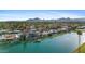 Scenic aerial view of waterfront homes with community pool and lush landscaping at 8210 E Del Cadena Dr, Scottsdale, AZ 85258