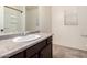 Bathroom featuring a modern vanity, shower, and toilet in a bright and clean space at 8879 W Cameron Dr, Peoria, AZ 85345