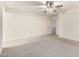 A bedroom with a ceiling fan, neutral walls, and carpet flooring at 8879 W Cameron Dr, Peoria, AZ 85345