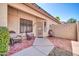 Welcoming outdoor patio area with comfortable seating and lovely landscaping, perfect for relaxation at 8921 W Laurel Ln, Peoria, AZ 85345