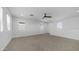 Open bonus room featuring neutral color palette and great natural light at 9936 E Revolution Dr, Mesa, AZ 85212