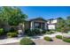 Charming home with well-maintained landscaping and a welcoming front porch at 9936 E Revolution Dr, Mesa, AZ 85212