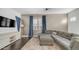 Comfortable living room with stylish furnishings and a large sectional sofa at 9936 E Revolution Dr, Mesa, AZ 85212