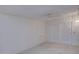 Bright and spacious bedroom featuring neutral carpeting and a closet with sliding doors for optimal storage at 10020 W Royal Oak Rd # F, Sun City, AZ 85351