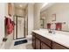 Well-maintained bathroom featuring a glass-door shower and a modern vanity at 10402 E Starion Ave, Mesa, AZ 85212