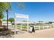 Community farm with fenced garden plots, offering residents fresh produce and a connection to nature at 10402 E Starion Ave, Mesa, AZ 85212