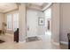 Bright entryway with tile flooring, neutral paint, and transom windows providing natural light at 10402 E Starion Ave, Mesa, AZ 85212