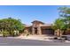 Charming single-Gathering home with desert landscaping, an inviting entrance, and a two-car garage at 10402 E Starion Ave, Mesa, AZ 85212