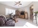 Inviting living room with wooden furniture, providing ample storage and display space at 10402 E Starion Ave, Mesa, AZ 85212