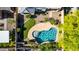 Backyard aerial featuring a kidney-shaped pool, desert landscaping, and a covered patio area with an outdoor grill at 11127 E Tripoli Ave, Mesa, AZ 85212