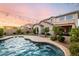 Home featuring a backyard pool at 11127 E Tripoli Ave, Mesa, AZ 85212