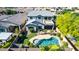Aerial view of backyard featuring a beautiful pool, landscaping, and covered patio, perfect for outdoor living at 11127 E Tripoli Ave, Mesa, AZ 85212