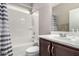 A bathroom showcasing a tub and shower combination at 11127 E Tripoli Ave, Mesa, AZ 85212