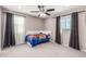 Neutral bedroom with ceiling fan and carpet flooring at 11127 E Tripoli Ave, Mesa, AZ 85212