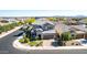 Well-manicured home features desert landscaping, multi-car garage and clean lines, perfect curb appeal at 11127 E Tripoli Ave, Mesa, AZ 85212