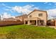 Inviting backyard with covered patio, perfect for outdoor entertaining and relaxing at 11473 W Austin Thomas Dr, Surprise, AZ 85378
